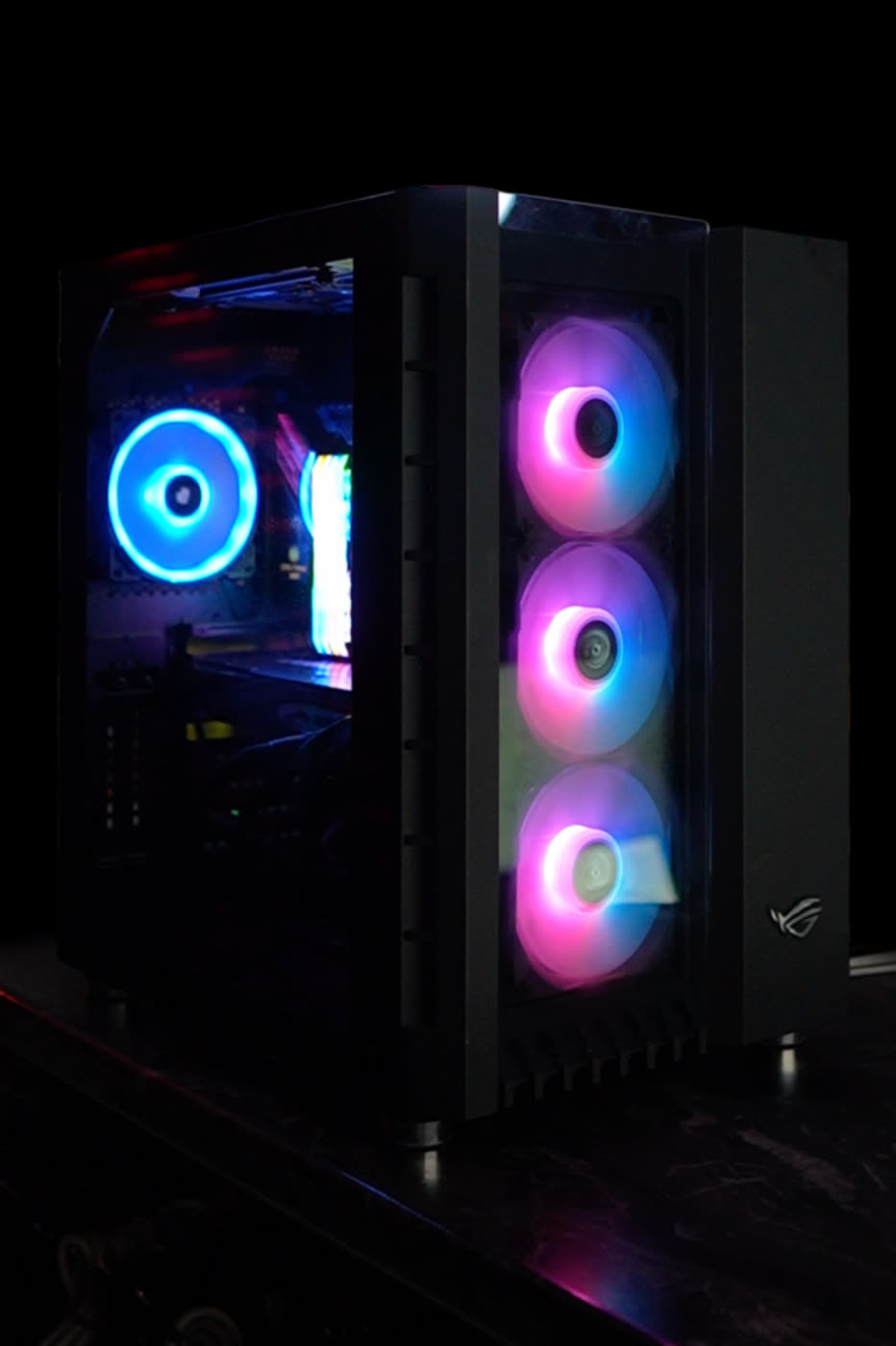 Finished custom gaming PC with tempered glass and three RGB front fans